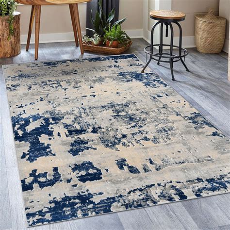 Celine Nights Abstract Blue/Beige Area Rug 